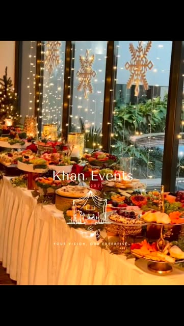 Holiday grazing table by a lit window